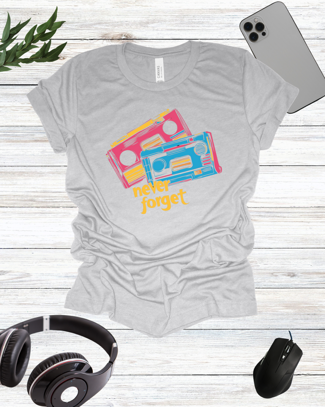 a t - shirt that says never forget with headphones and headphones