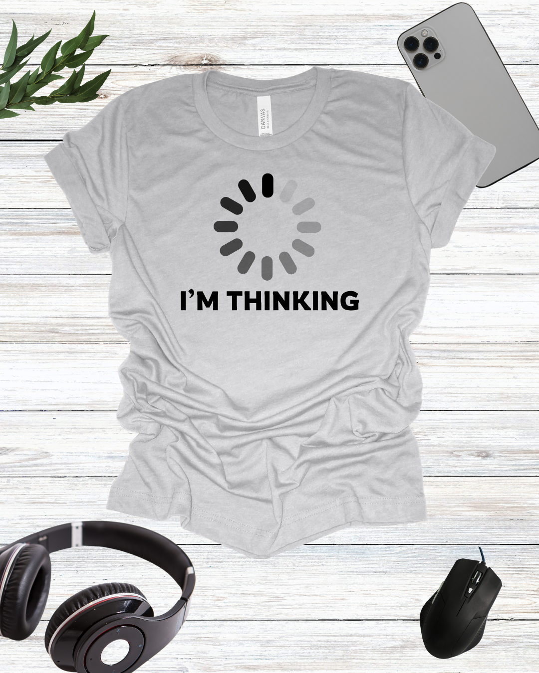 a t - shirt that says i'm thinking with headphones and headphones