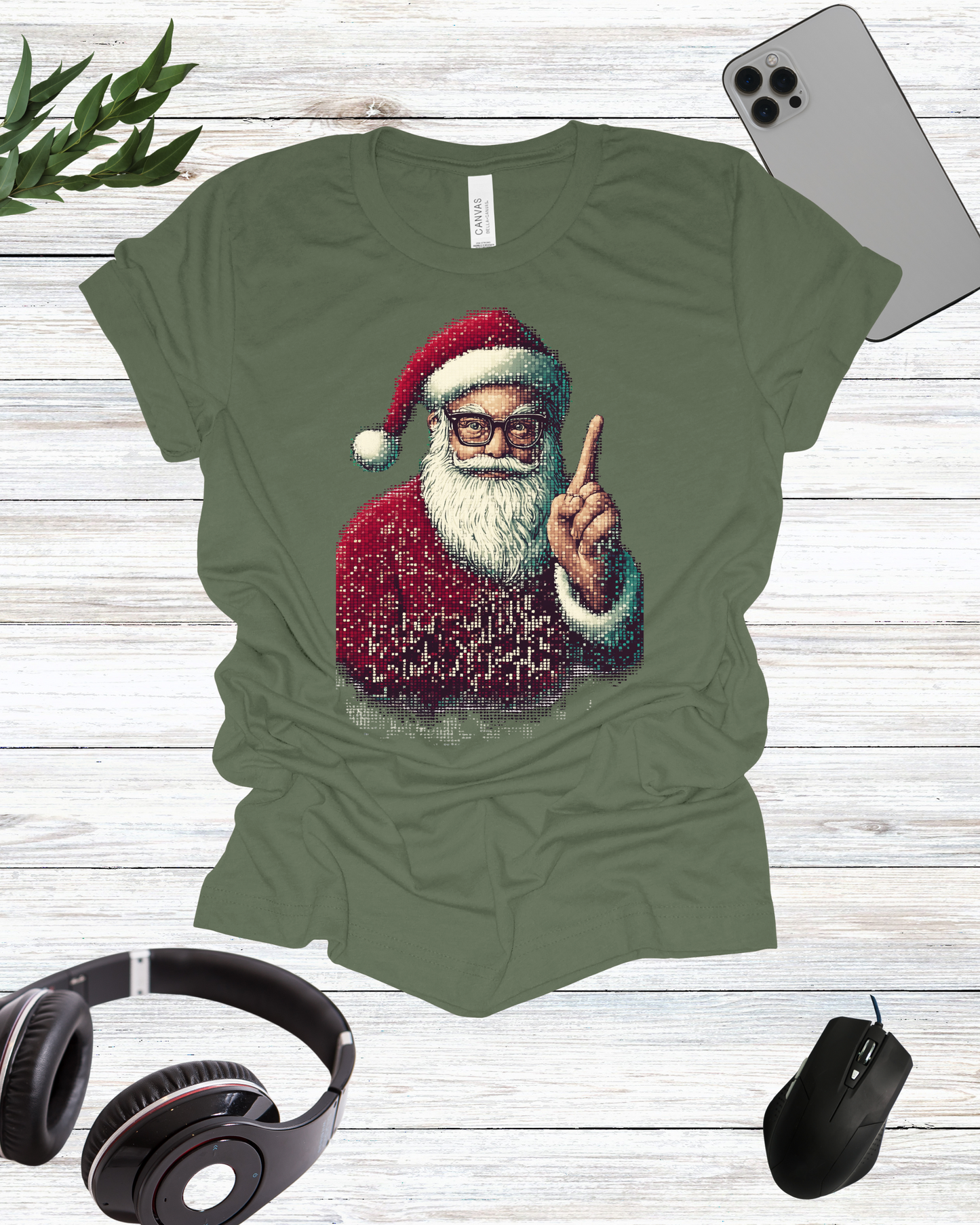 a green shirt with a picture of a santa clause on it